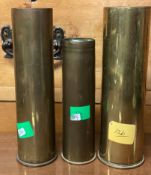 Three old shell cases.