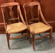 Two child's cane seated chairs.