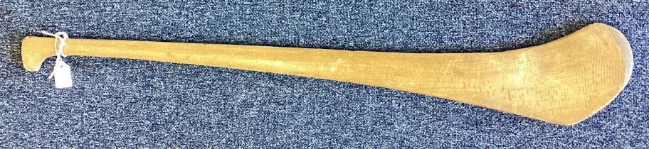 A wooden hurling stick.