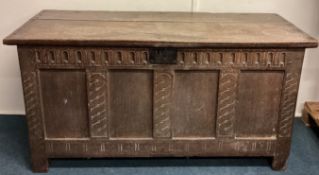 An oak hinged top coffer.