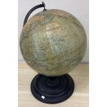 A globe on wooden stand.