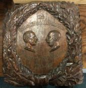 A good quality carved oak German wall plaque.