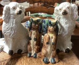 Two pairs of Staffordshire dogs.