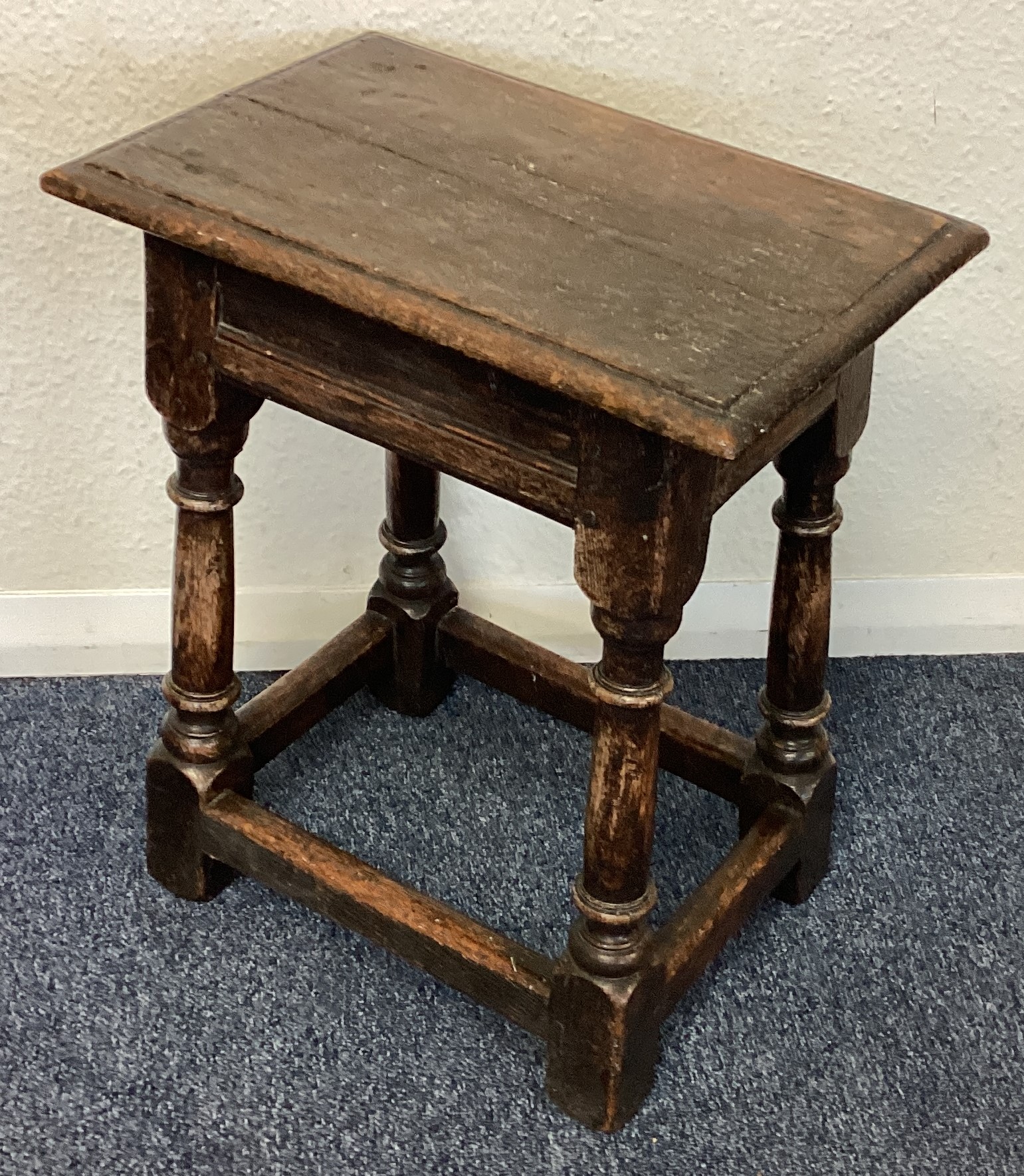 A small oak coffin stool.