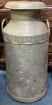 An old aluminium milk churn.