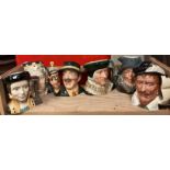 A collection of Royal Doulton "Toby" character jugs.