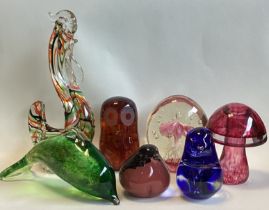 A selection of glass paperweights in the form of animals to included Wedgwood.