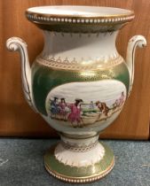 A large Spode vase decorated with golfing scene.