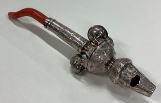 An 18th Century George III silver rattle.