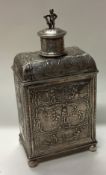 A 19th Century Dutch silver tea caddy with embossed decoration.