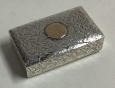 A Victorian silver snuff box with hinged lid.