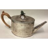 An 18th Century George III silver teapot. London 1789.