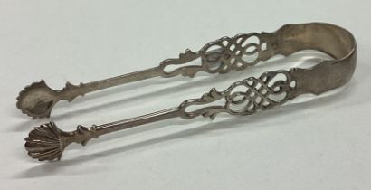 A pair of 18th Century Georgian silver ice tongs with pierced decoration.