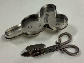 A rare pair of silver toy candle snuffers on tray.