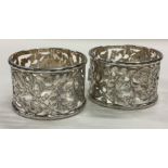 A pair of Victorian silver napkin rings with pierced decoration.