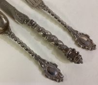 A fine Victorian silver three-piece christening set.