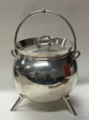 A rare novelty silver tea caddy in the form of a cauldron.