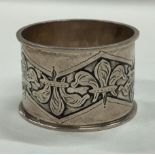 A rare Arts and Crafts silver napkin ring. Birmingham 1911. By Charles Edwards.