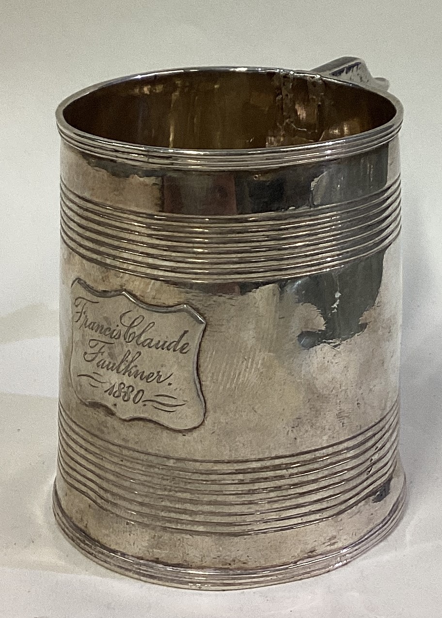 A George III silver reeded mug. London 1819. - Image 2 of 3