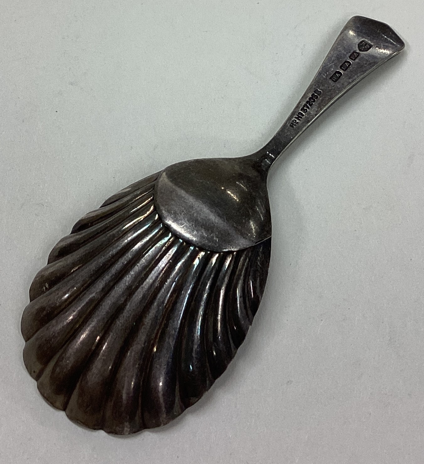 A silver plated fluted caddy spoon. - Image 2 of 2