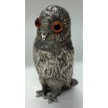 A rare novelty Victorian silver hinged box / inkwell in the form of an owl.