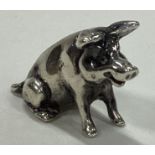 A contemporary silver figure of a pig.