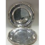 A good pair of silver dinner plates. London 1746.