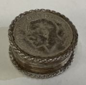 An 18th Century silver snuff box.