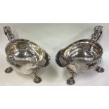 A pair of mid 18th Century George III silver sauce boats.