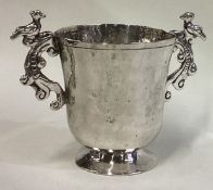 An 18th Century silver two-handled cup.