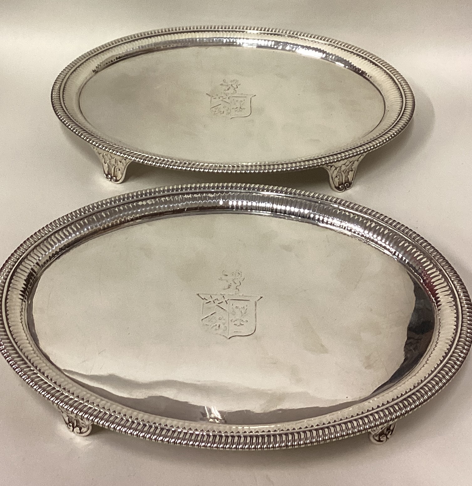 A rare and fine pair of George III silver salvers with gadroon borders. - Image 2 of 4