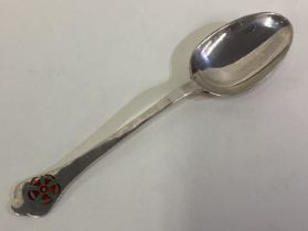 A silver and enamelled rat tail trefid spoon.