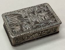 A Chinese silver snuff box embossed with figures.