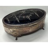 A large silver and tortoiseshell jewellery box.