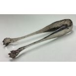 A large pair of Continental silver claw ice tongs.