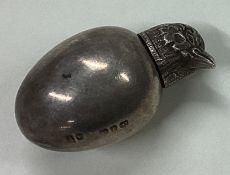 A rare Victorian silver scent bottle in the form of a chick.