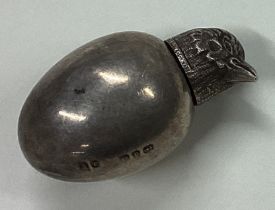 A rare Victorian silver scent bottle in the form of a chick.