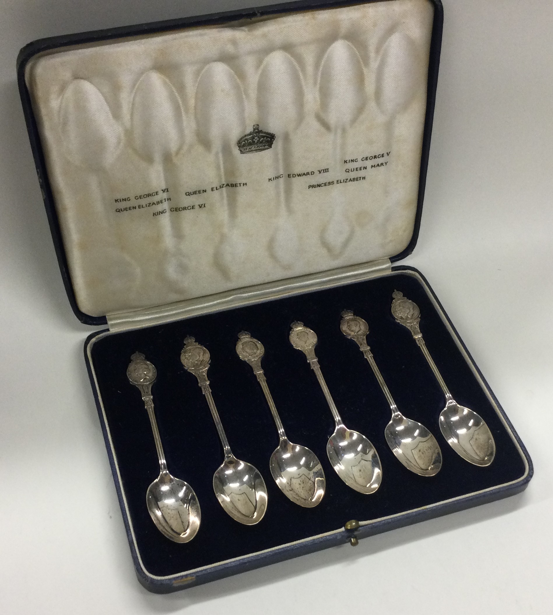 A cased set of six silver spoons commemorating Kings and Queens.