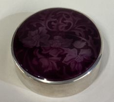 A Continental silver and purple enamelled box.