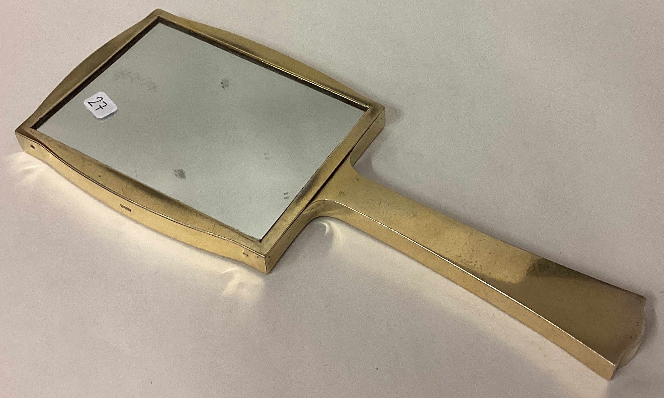 ASPREY & CO: A rare Art Deco silver gilt mirror.