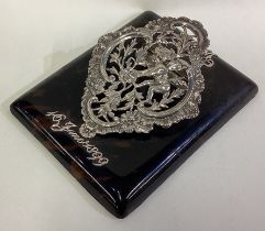 A fine Victorian silver and tortoiseshell paper holder.