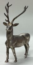 A novelty heavy silver figure of a stag.