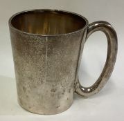 A Chinese silver mug. Marked EAC 935.
