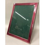 A large Italian silver and pink enamelled picture frame.