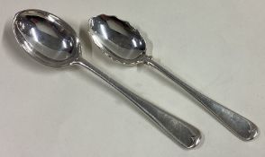 A rare silver picture back spoon together with a fluted spoon.