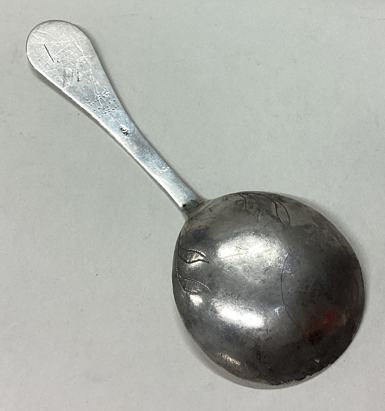 An 18th Century Norwegian silver spoon with engraved floral decoration to terminal. - Image 2 of 3