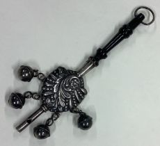 A large Sterling silver rattle.