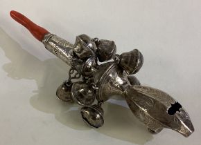 An 18th Century George III silver rattle.