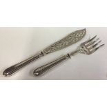 A pair of Victorian silver servers.