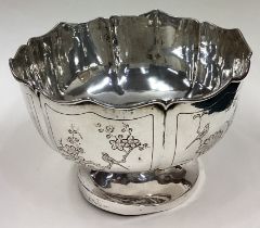 A good Chinese silver bowl attractively decorated with birds and figures.
